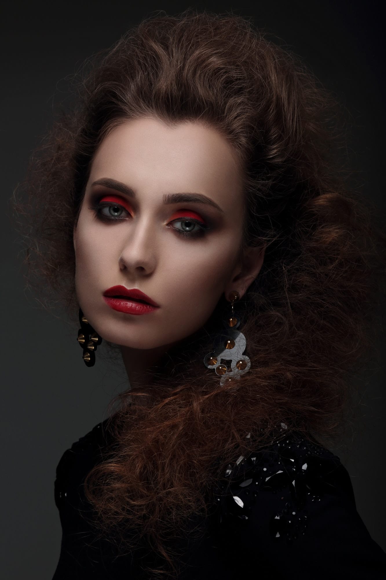 Portrait of a woman with high hair and red lips.